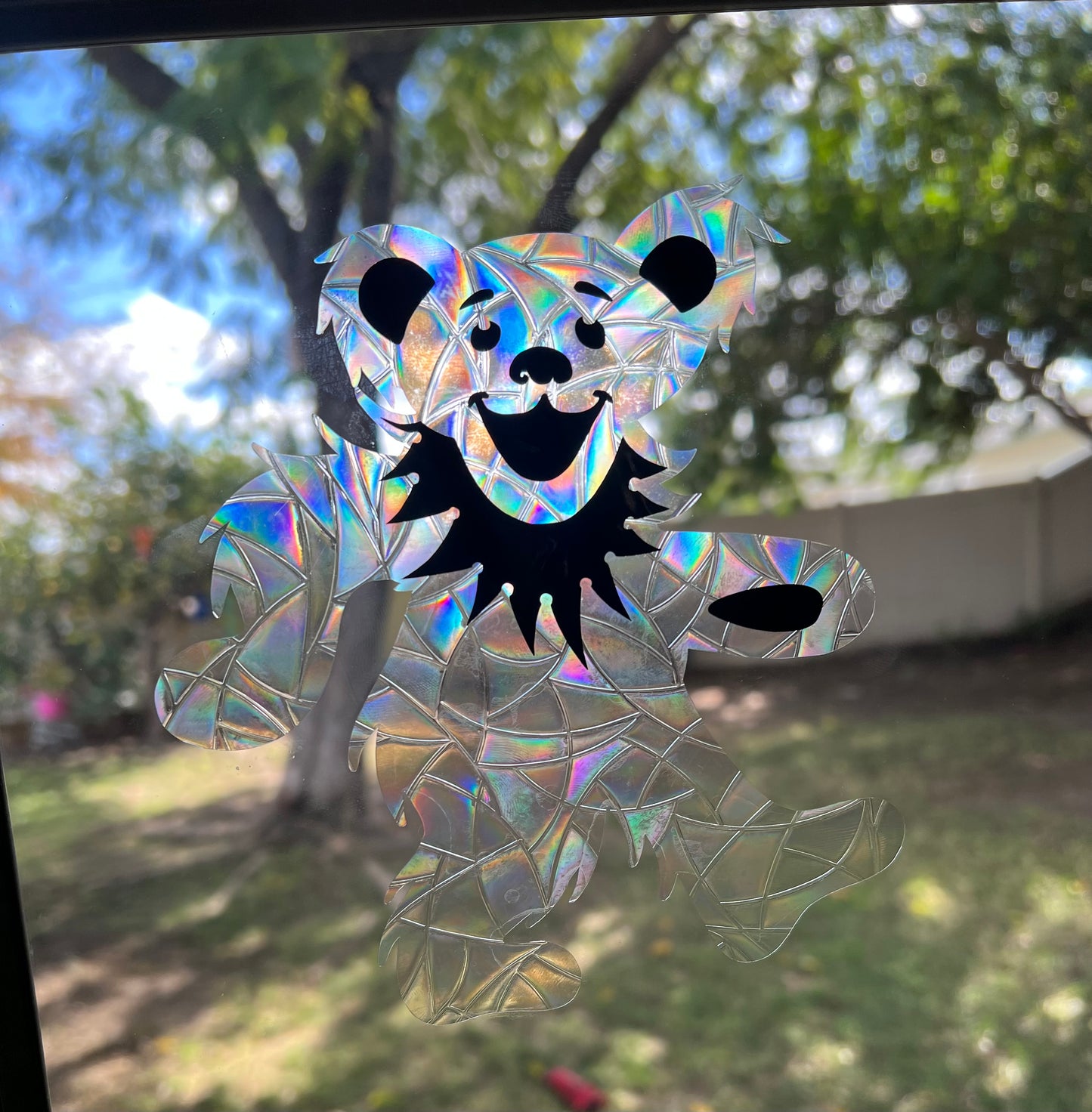 Marching bear window cling