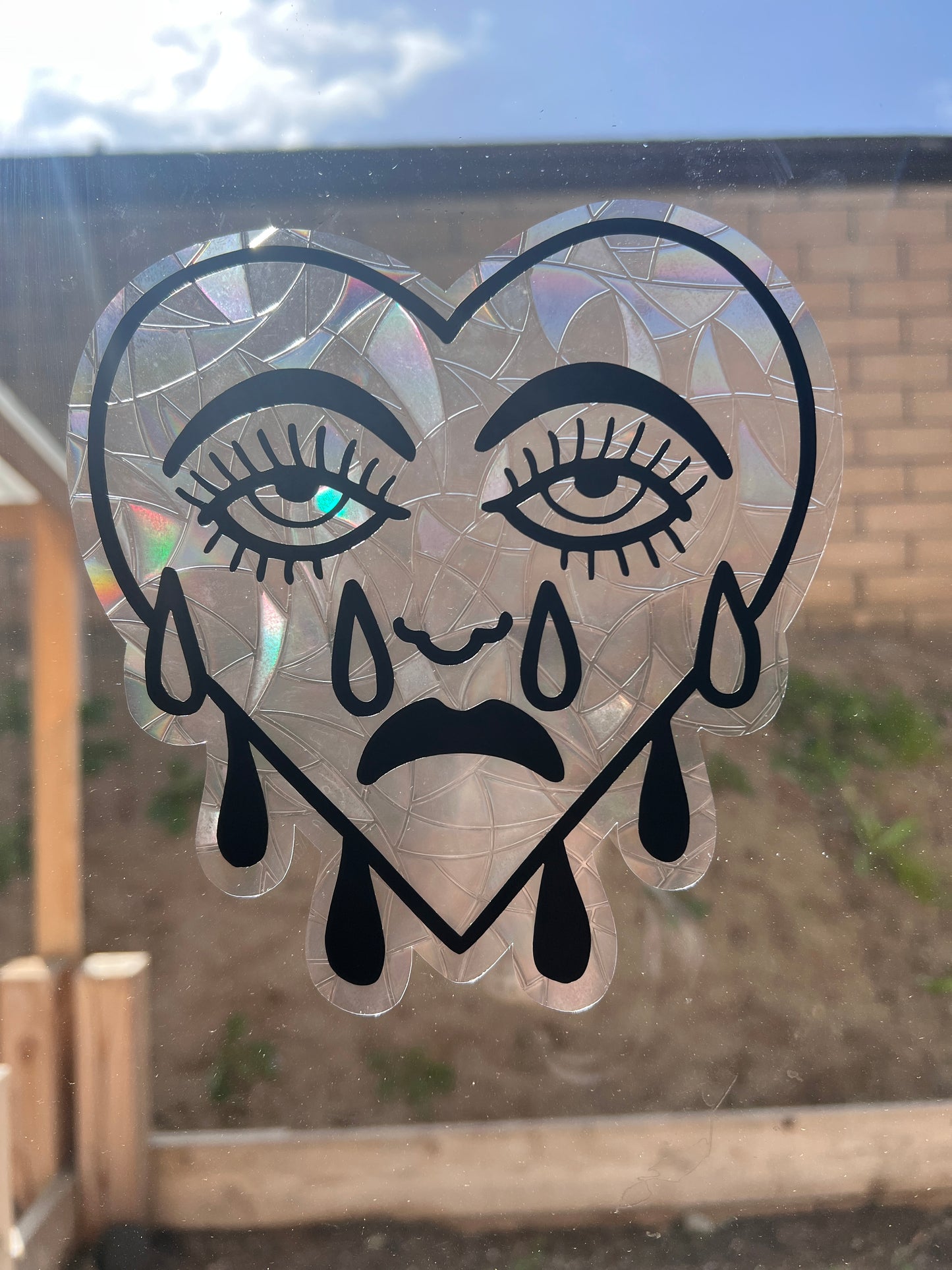 Crybaby window cling