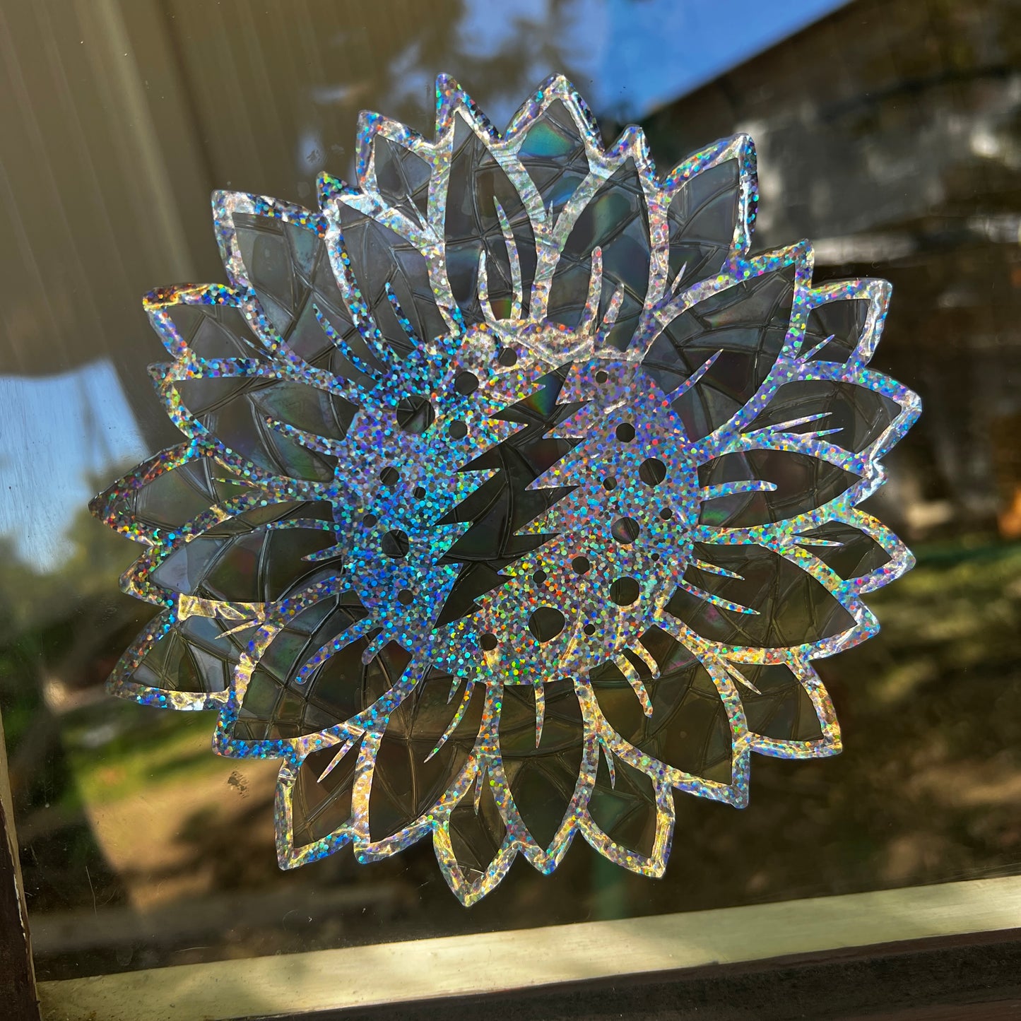 Iridescent sunflower bolt window clings